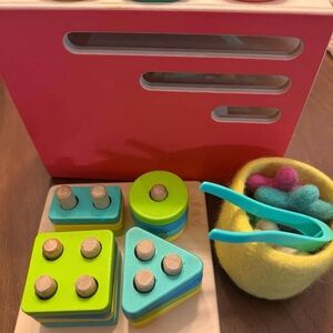 Vibrant Wooden Shape Sorting Toy with Tongs